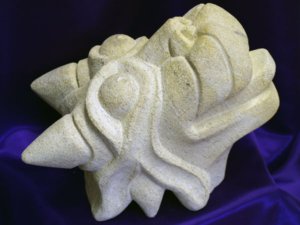 The finished dragon head carved in Ancaster limestone