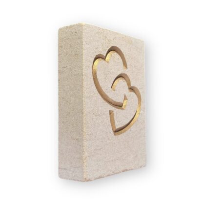 Entwined hearts in Ancaster limestone
