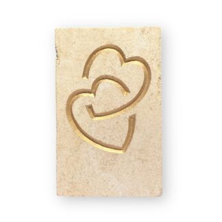 Entwined hearts in Ancaster limestone