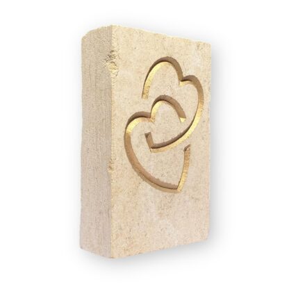Entwined hearts in Ancaster limestone