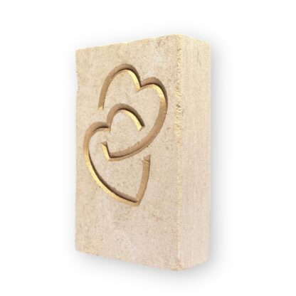 Entwined hearts in Ancaster limestone