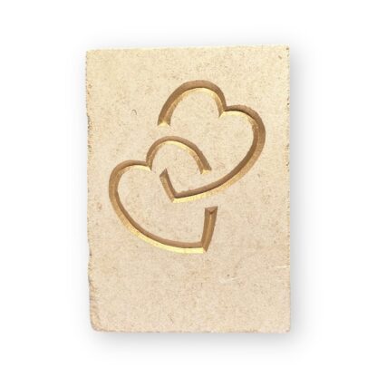 Entwined hearts in Ancaster limestone