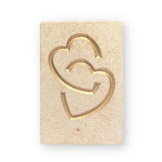 Entwined hearts in Ancaster limestone