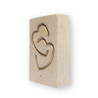 Entwined hearts in Ancaster limestone