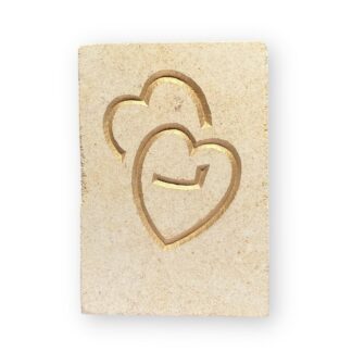 Entwined hearts in Ancaster limestone