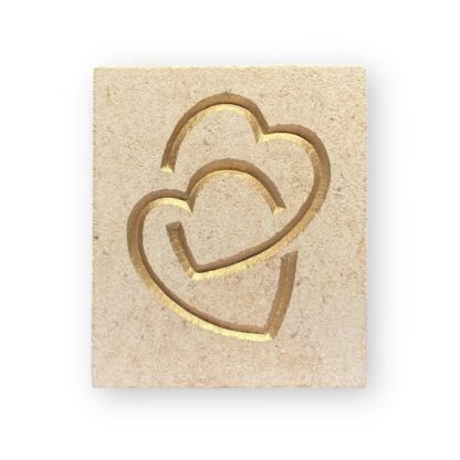 Entwined hearts in Ancaster limestone