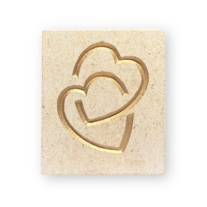 Entwined hearts in Ancaster limestone