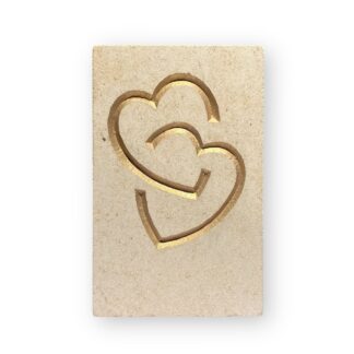 Entwined hearts in Ancaster limestone