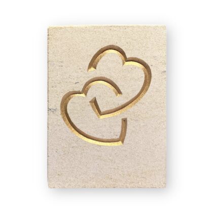 Entwined hearts in Ancaster limestone
