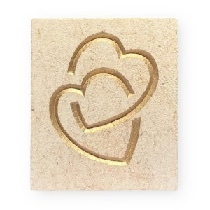 Entwined hearts in Ancaster limestone