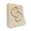 Entwined hearts in Lincoln Cathedral limestone