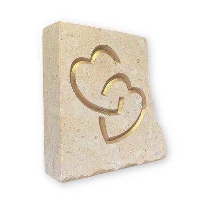Entwined hearts in Lincoln Cathedral limestone