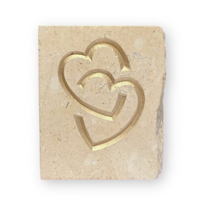 Entwined hearts in Lincoln Cathedral limestone