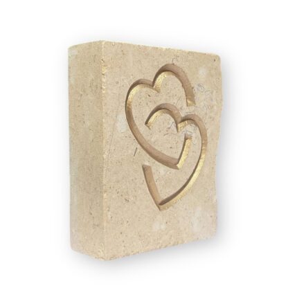 Entwined hearts in Lincoln Cathedral limestone