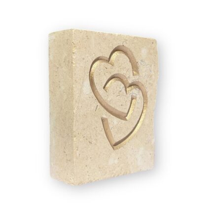 Entwined hearts in Lincoln Cathedral limestone