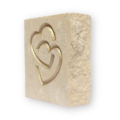 Entwined hearts in Lincoln Cathedral limestone
