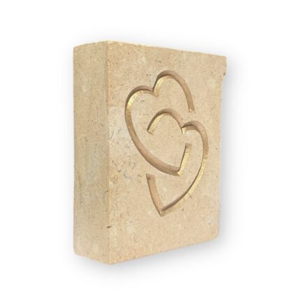 Entwined hearts in Lincoln Cathedral limestone