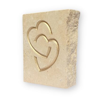 Entwined hearts in Lincoln Cathedral limestone