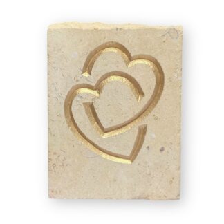 Entwined hearts in Lincoln Cathedral limestone