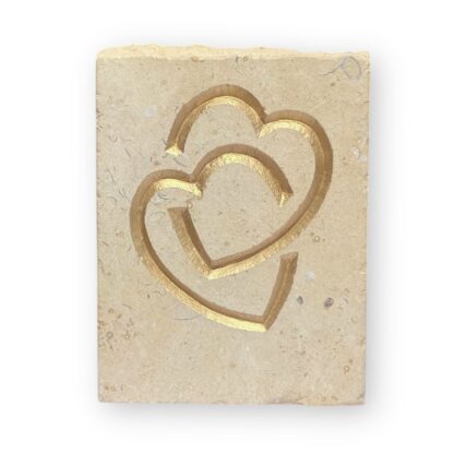 Entwined hearts in Lincoln Cathedral limestone