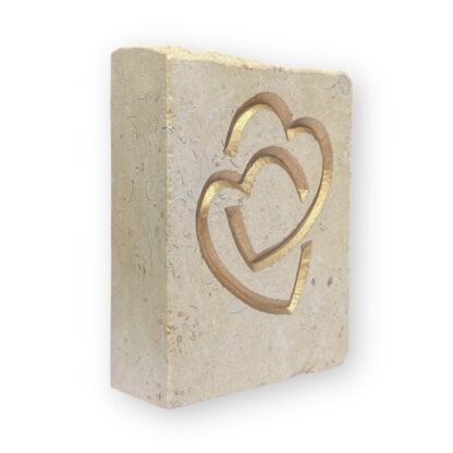 Entwined hearts in Lincoln Cathedral limestone
