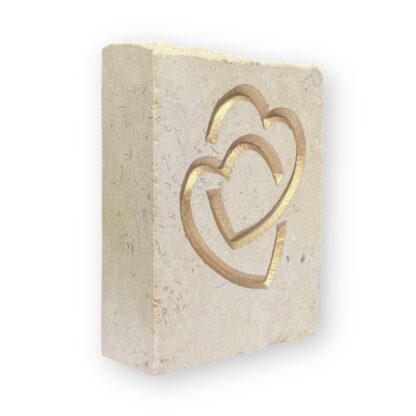 Entwined hearts in Lincoln Cathedral limestone
