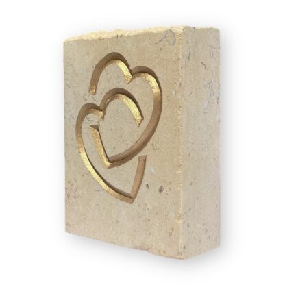 Entwined hearts in Lincoln Cathedral limestone