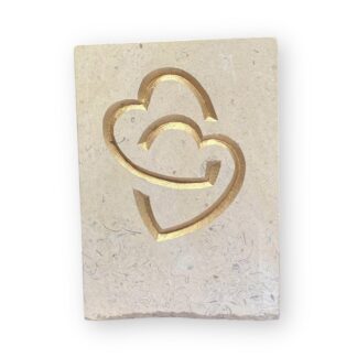 Entwined hearts in Lincoln Cathedral limestone