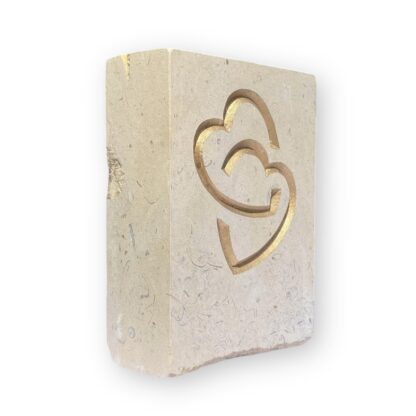 Entwined hearts in Lincoln Cathedral limestone