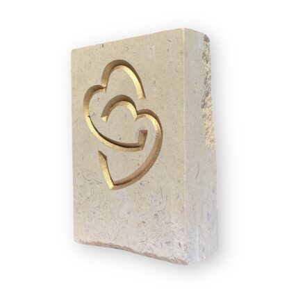 Entwined hearts in Lincoln Cathedral limestone