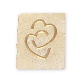 Entwined hearts in Lincoln Cathedral limestone