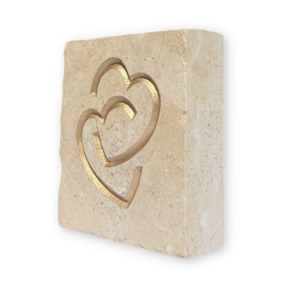 Entwined hearts in Lincoln Cathedral limestone