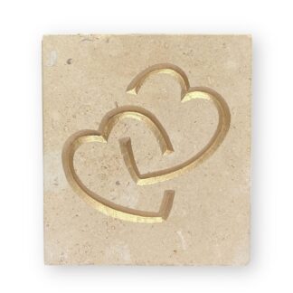 Entwined hearts in Lincoln Cathedral limestone