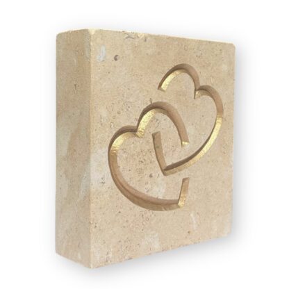 Entwined hearts in Lincoln Cathedral limestone
