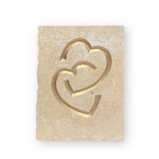 Entwined hearts in Lincoln Cathedral limestone