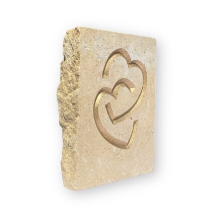 Entwined hearts in Lincoln Cathedral limestone
