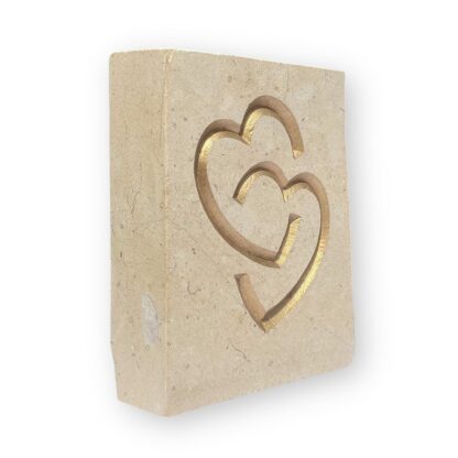Entwined hearts in Lincoln Cathedral limestone