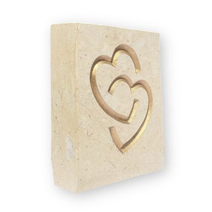 Entwined hearts in Lincoln Cathedral limestone