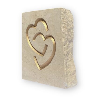 Entwined hearts in Lincoln Cathedral limestone
