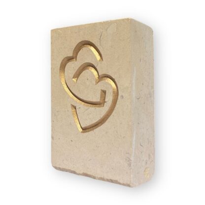 Entwined hearts in Lincoln Cathedral limestone