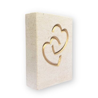 Entwined hearts in Ancaster limestone