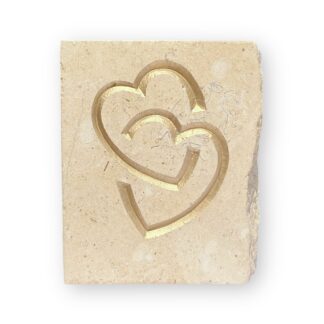Entwined hearts in Lincoln Cathedral limestone