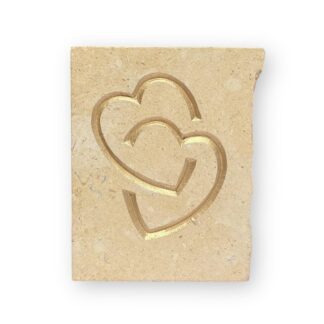 Entwined hearts in Lincoln Cathedral limestone