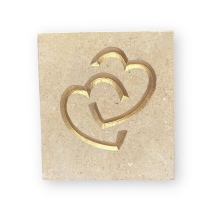 Entwined hearts in Lincoln Cathedral limestone