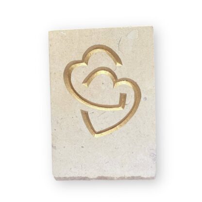 Entwined hearts in Lincoln Cathedral limestone